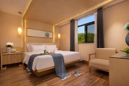 Fuyang Moli Luhua Business Hotel (Fuyang ecological paradise store) Отели рядом с достопримечательностью «Valley of Flowers Adventure Park»