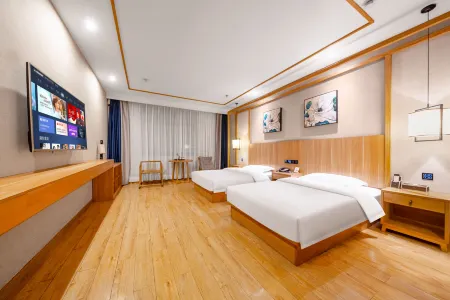 Yueju Hotel (Xinyang High-speed Railway East Station Daxin Plaza) Отели рядом со станцией Xinyang East Railway Station