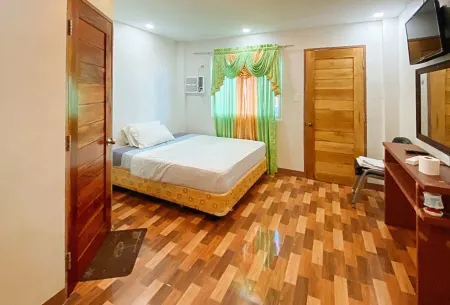 RedDoorz @ 4ks Pension House Bogo City Cebu Отели рядом с достопримечательностью «Lapyahan sa San Remigio»