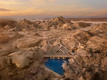 Desert Rock Resort Отели в г. Умлуж