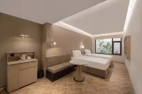 Qingdao May Fourth Square MixC Ruimai Hotel