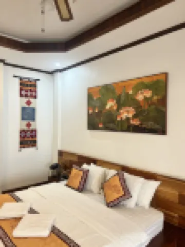 Queen's House Hoteles cerca de Wat Mai