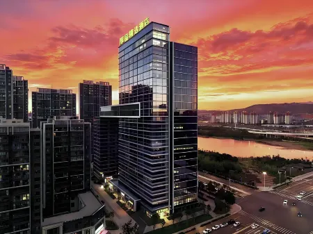 Hopin Select Hotel (Kunming High-speed Railway South Station college town) Отели рядом с достопримечательностью «Kunming University of Science and Technology Chenggong Campus Library»