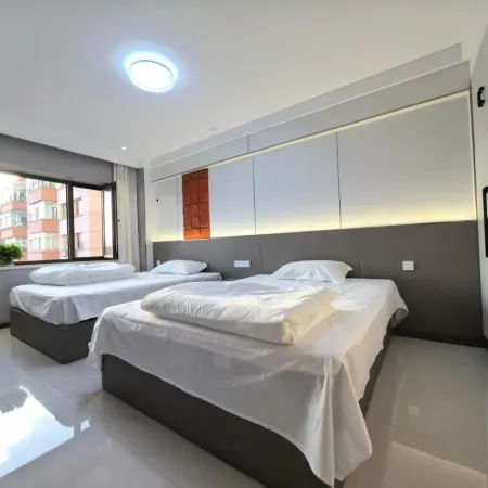 Harbin Tiantian Family Apartment Отели рядом с достопримечательностью «Heilongjiang University Gymnasium»