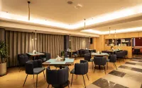 Longkou LanOuShangPin Hotel (Bosshang Shopping Plaza)