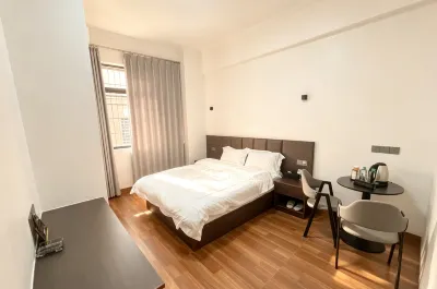 怡居公寓 Hotels in Triumph Business Plaza