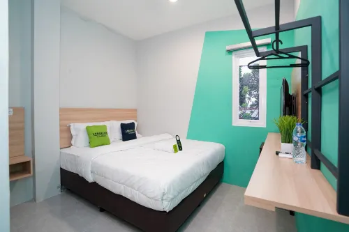 Urbanview Manukan Family Inn Surabaya - Bãi đậu xe