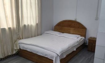 Longsheng Xinji Hotel - Housity