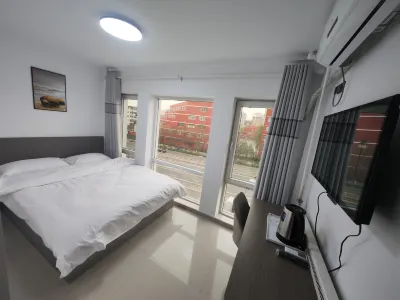 Xincheng Hotel Отели рядом с достопримечательностью «Памятник Революционной Активности Старого Мемориала Национального Учрежд»
