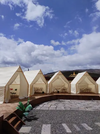 Zhuishan.Yala Minjing B&B Отели рядом с достопримечательностью «Тагун»