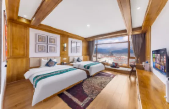 Lost Horizon Yueguang Qingcheng Scenic Homestay (Dukezong Ancient City) 독커종 꽃길 주변 호텔