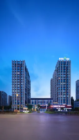 Jingdezhen Xin Baidu Hotel (China Ceramic Museum Ancient Kiln Folk Customs Expo Area Branch) Отели рядом с достопримечательностью «Moon Lake Scenic Area»