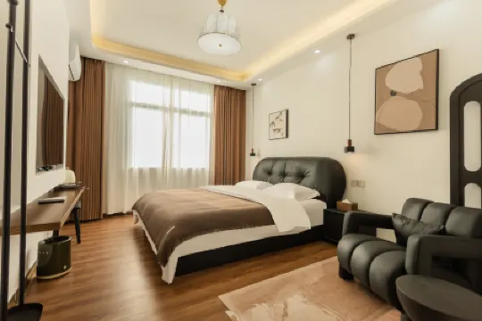 Gunai Good Night Homestay (Wucaitan Branch, Weizhou Island) Отели рядом с достопримечательностью «Great Palace»