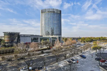 Longyou Baoli Clear Water Bay  Hotel Отели в г. Луню