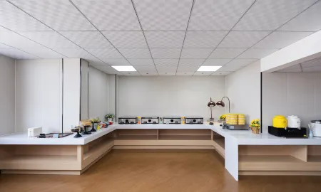 Pusino Hotel Отели рядом с достопримечательностью «Shangqiu Institute of Technology»