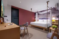 Xi Er Man Hotel (Huaguoyuan Twin Towers Fangyuanhui Dolphin Plaza)