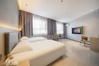 Qingji Hotel (Yumen Railway Station Times Plaza Branch