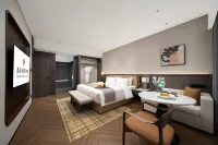 โรงแรมเจียงกวอ แพลตินั่ม (ร้านอาหารและพลาซ่าอาหารชื่อดังของเมืองชินโจว) - ที่มีที่จอดรถ