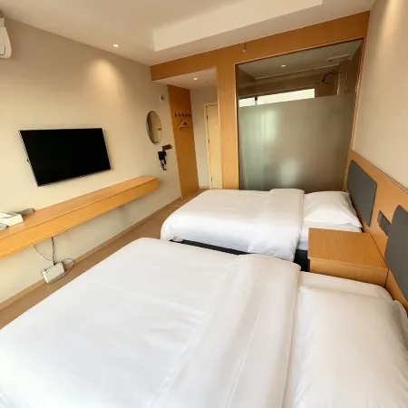 Zhouming Yuxiang Express Hotel (Suining Railway Station)