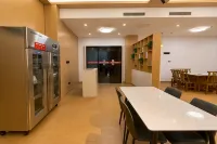 Yilong International Hotel (Xincai Moon Bay Park) - فطور