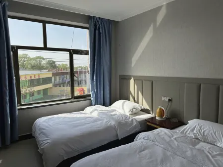 Jingbian Yuemeisu Hotel Отели рядом с достопримечательностью «The Wave Valley Scenic Area»