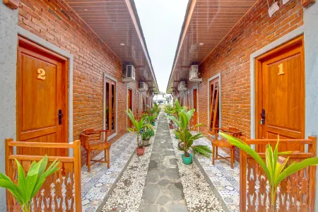 OYO 92606 Djoglo Boto Homestay Syariah Отели в г. Sewon