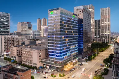 Zhuxin Hotel (Baolong Subway Station) Hotels in Shenzhen Pingshan Railway Station