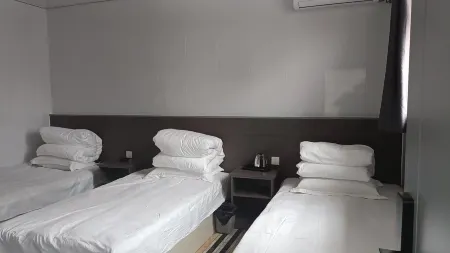 Fuqiang Guest House (Gongnong Road Branch) Отели рядом с достопримечательностью «Dashiqiao Mizhen Mountain»