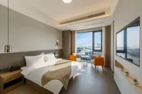 Ronghai Juzhu B&B (Baolong Tiandi Banshengdong Wharf) - Apartments