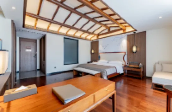Jinghong Tianqing Hotel (Yijin Holo City Government Shop)