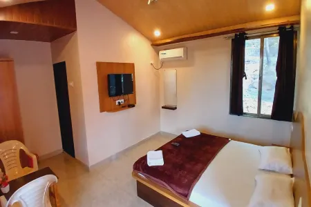 Hotel Blue Heaven Отели в г. Махабалешвар