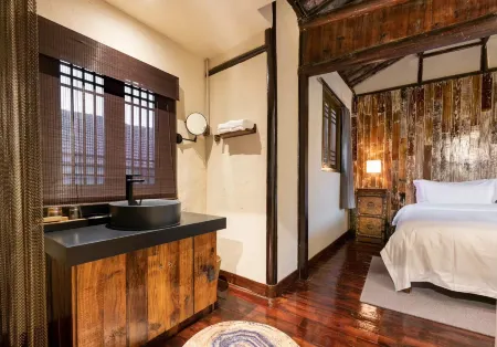 Lan Duo San Wu Dou Homestay Отели рядом с достопримечательностью «Wansheng Rice Merchants»