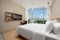 Qiyu Hotel (Futian Port Branch of Shenzhen Convention and Exhibition Center) Hotel berhampiran Xinghe Coco Park