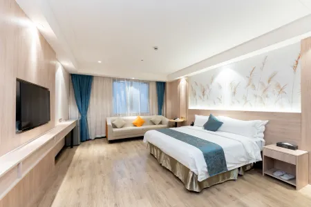 Shanghai Qiju Hotel (Songjiang University Town Wanda Plaza Branch) Отели рядом с достопримечательностью «Shanghai International Studies University (Wenxiang Road)»