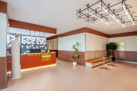 Chocolate Qukeli Hotel (Feixi Xuhui Cmall) Отели в г. Фэйси