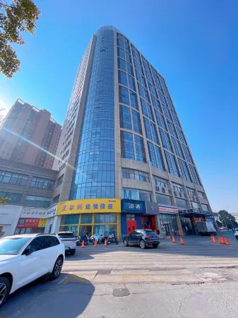 Fenghua Oriental · High-altitude City View Smart Hotel (Suqian Baolong Square Store) Отели рядом с достопримечательностью «Suqian University»