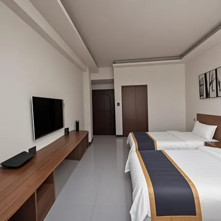 Linjiang Guanglong Business Hotel