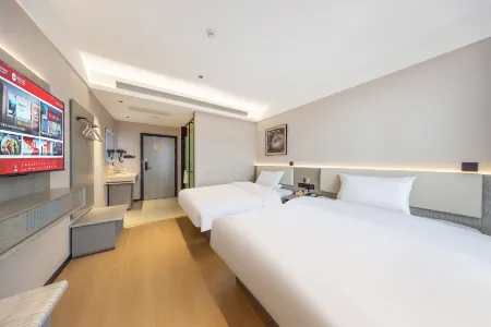 Huayue JingZhi Hotel (Yantai Longkou HePing Road Branch) Отели рядом с достопримечательностью «Dao'enhu Park»