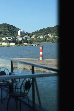 Find a Lighthouse Lake View B&B Отели рядом с достопримечательностью «Dongqian Lake Xiaoputuo»