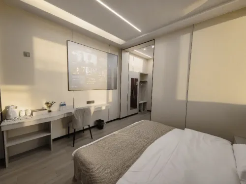 Binchuan Xinjing Hotel