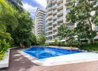 Group Family Suite Tambuli Residences 1-Bedroom, Sleeps up to 6 by Dominik Pool Balcony Mactan - สระว่ายน้ำแบบอินฟินิตี้