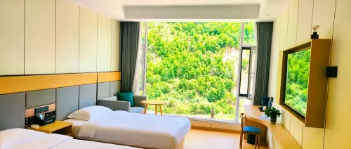 Eman Yinlu All Seasons Homestay (Guan'egou Grand Scenic Area)