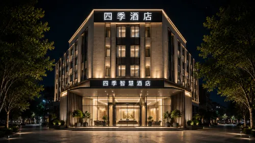 Four Seasons Smart Hotel (Zhoukou Passenger Transport Center Station)