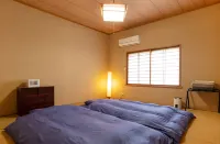 Guesthouse UZU SADO - ห้องครัว