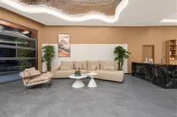 興義景峰飯店（夢樂城店） - 機場接送