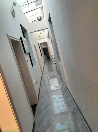 Luoping Jindian Inn Отели в г. Луопинсянь