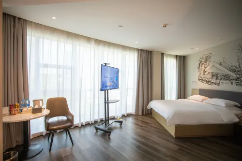 โรงแรมสไตล์บูทีคฉินลู่ ผิงเซียง (สาขารันดาอินเตอร์เนชั่นแนล)