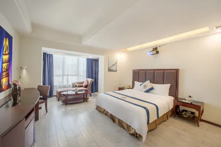 Haikou Baofa Shengyi Hotel (GuoMao Center Branch) Отели рядом с достопримечательностью «Thean Hou Temple»