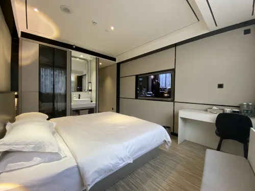 Yongguang Smart Hotel (Zhoukou Wuyi Square Passenger Transport Center Station) - 2 Yıldız
