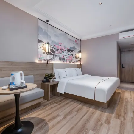 Hua Ju Hotel (Subway Station, Duduanqiao, Mudu Town, Suzhou) Отели рядом с достопримечательностью «Древний город Сучжоу Муду»